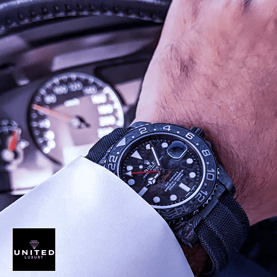 Rolex DiW NTPT Carbon Black Replica on his arm