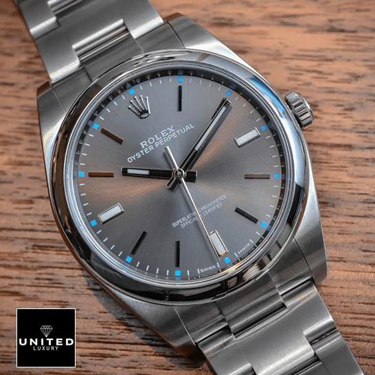 Rolex Datejust Perpetual 114300 Replica dial is a dark rhodium grey with luminescent hands and hour markers