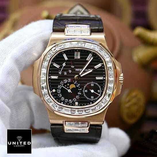 Patek Philippe Baguette Replica 2 Patek Philippe Black Dial Diamond Bezel Leather Bracelet Replica on the hand