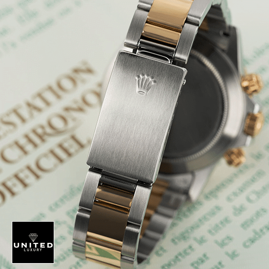 Rolex Daytona S.Steel Two Tone Bracelet Fold Clasp 16523 Replica on the table