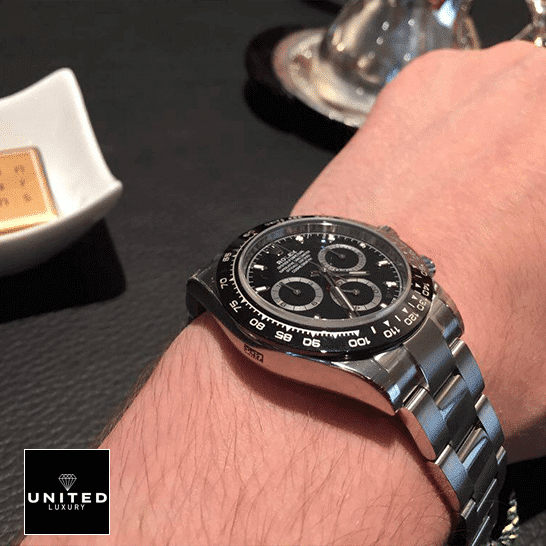 Daytona 116520 Black Dial Replica 6 Rolex Daytona 116500ln-0002 Black Bezel Oyster Replica on his arm