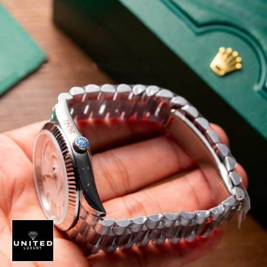 Rolex Olive Green Replica 2 Rolex 228239-0033 replica side view on the hand and rolex logo