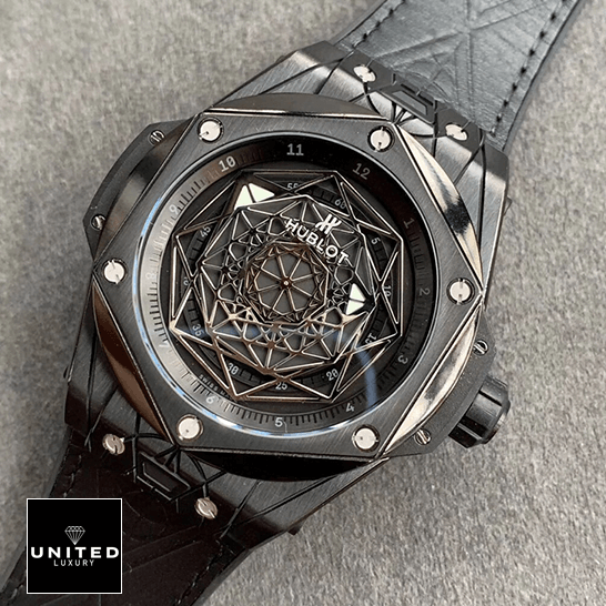 Hublot All Black Replica 2 Hublot Big Bang All Black Leather Bracelet Replica on the grey carpet